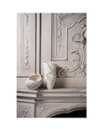 Two Fos Ceramiche Meltemi vases showcasing Italian craftsmanship and luxury artistry, elegantly placed on top of a mantle.