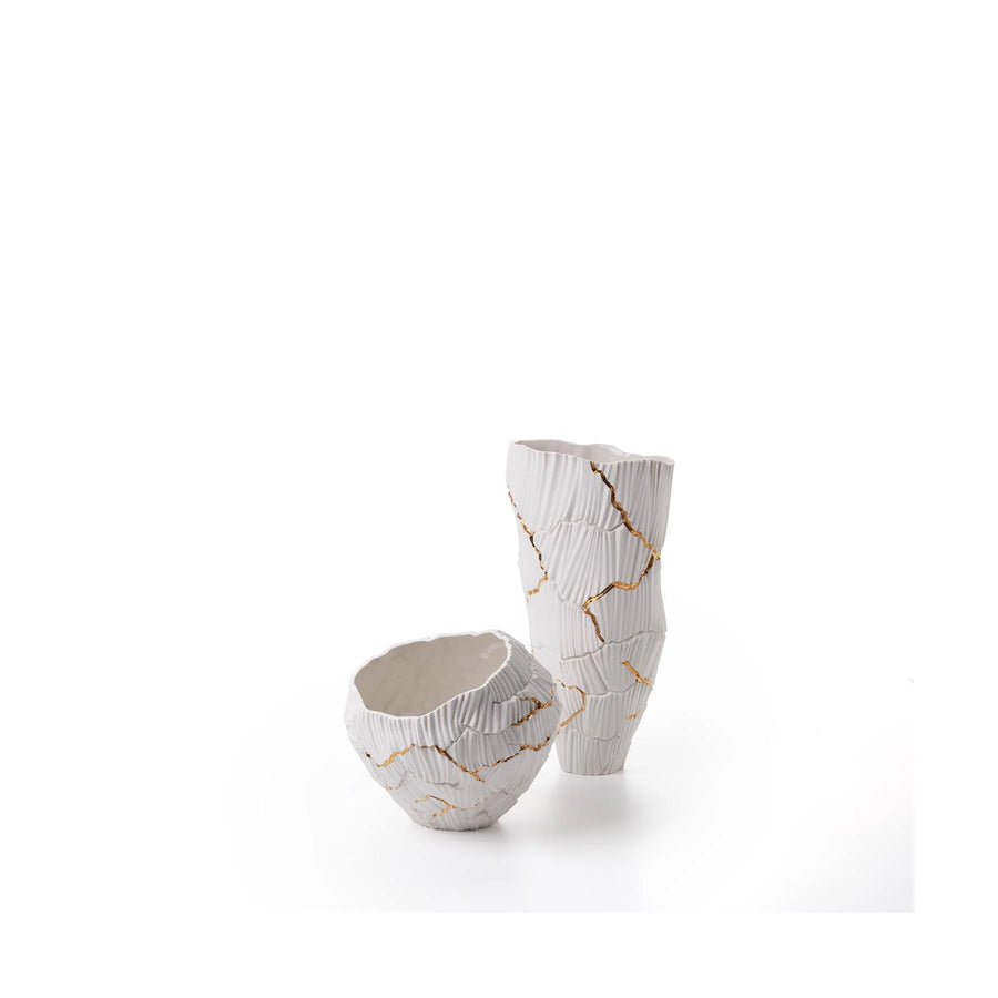 Here are two luxury Fos Ceramiche Meltemi vases, showcasing Italian craftsmanship, placed elegantly on a pristine white surface.