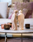 Two Gardeco Ceramic Sculpture Visitor Small Dune Cor47 figurines on a coffee table, showcasing exquisite craftsmanship.