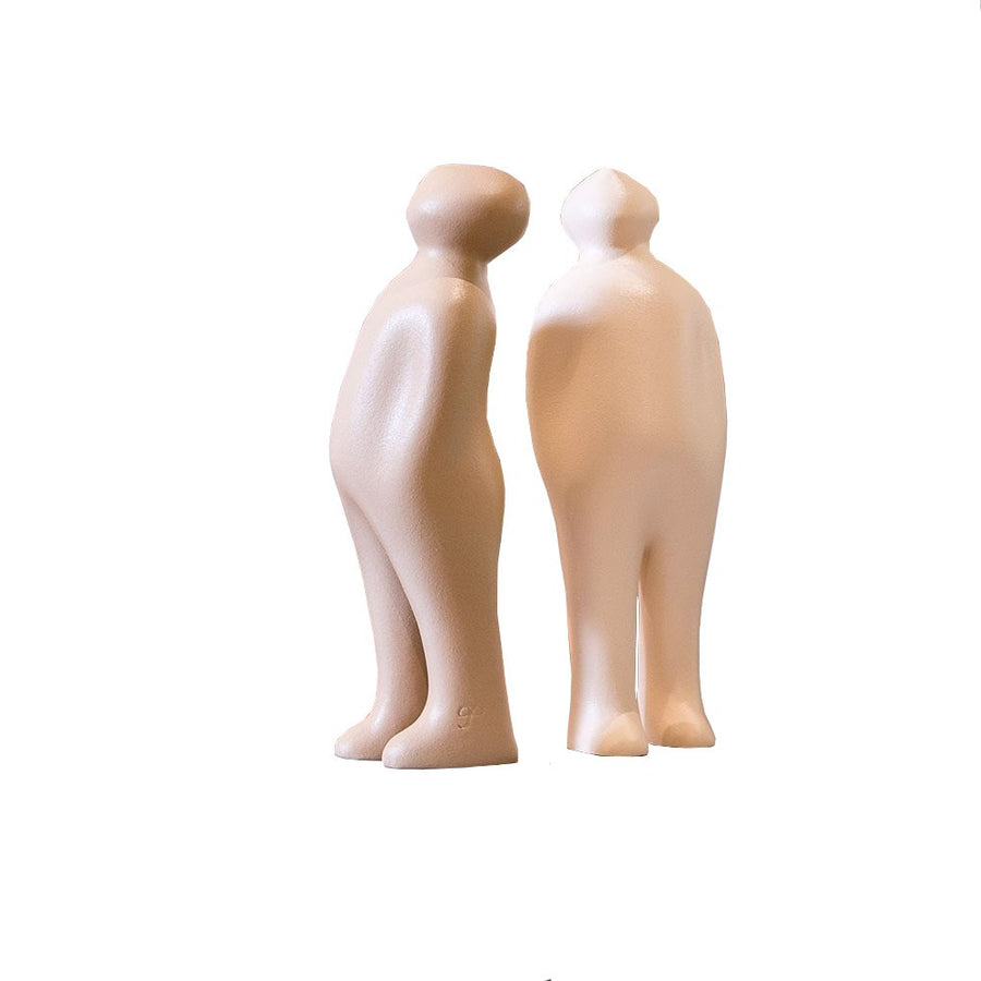 Two Gardeco Ceramic Sculpture Visitor Small Dune Cor47 figurines standing next to each other on a white background.