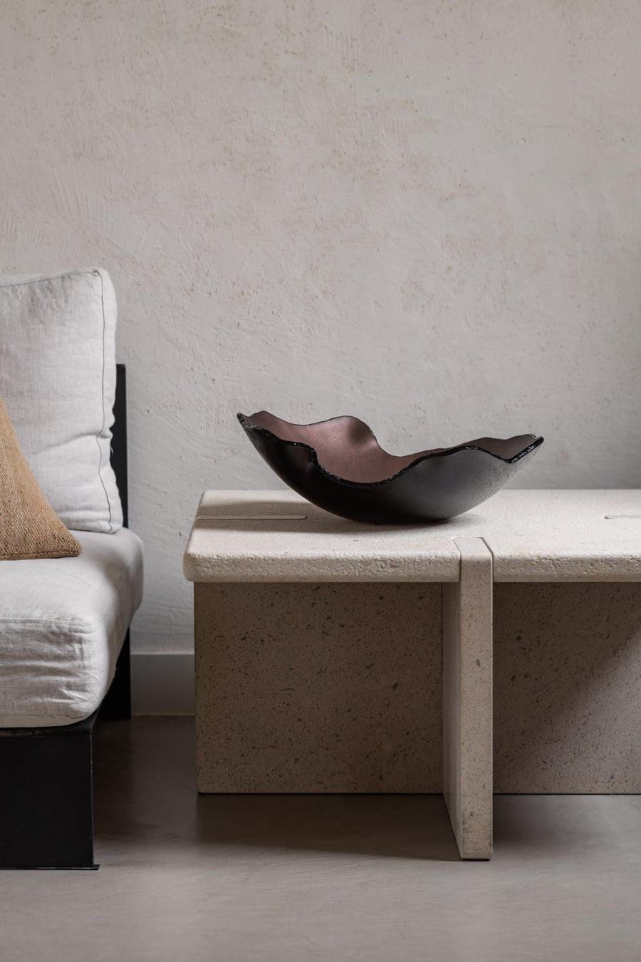 A Gardeco Glass Bowl Mini Mapa Corten on a table.