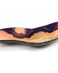 A vibrant purple and yellow Gardeco Glass Platter GG Ameba Bronze, perfect for interior decor.