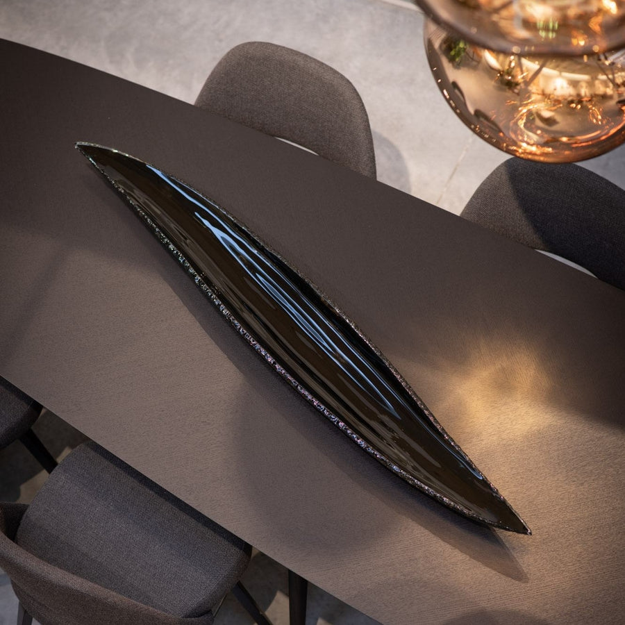 Regina Medeiros showcased her exceptional craftsmanship with a stunning Gardeco Glass Platter Quiabo Black with Top Bronze on a table available at Spacio India from Decor Accessories Collection.