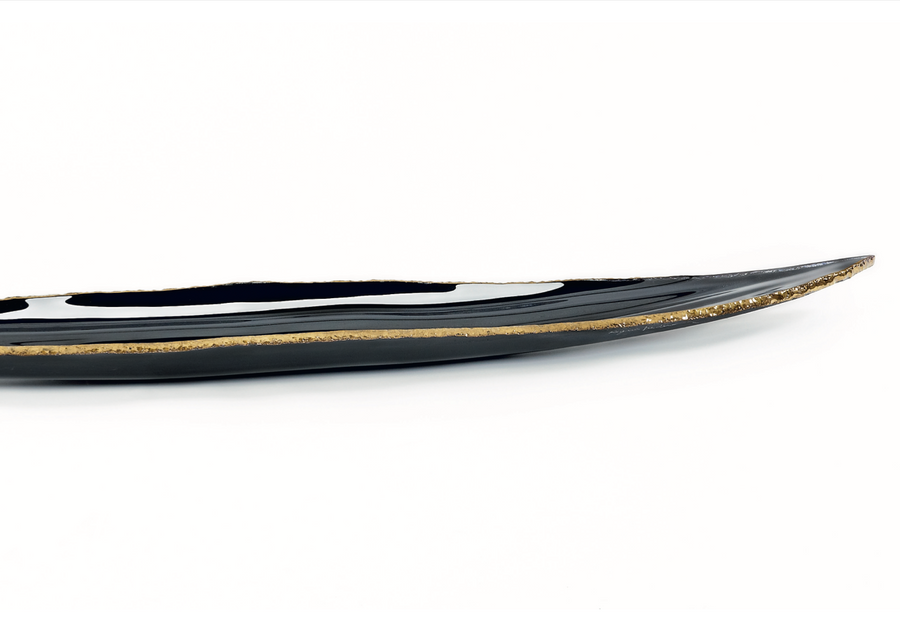 A Gardeco Glass Platter Quiabo Black with Top Bronze showcasing Regina Medeiros' exquisite craftsmanship.