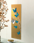 Goebel Blue Butterflies Wall Art on wall with a foliage in a interior available at Spacio India for Luxury Homes collection of Decor Accessories