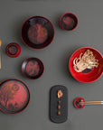 Top view of Ibride Ming Red China stackable set on a dining surface with Chinese dining cutlery accessories available at Spacio India for luxury home decor of collection Tableware Accessories