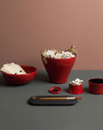 Ibride Ming Red China seven pieces stackable set on a dining surface with Chinese dining cutlery accessories available at Spacio India for luxury home decor of collection Tableware Accessories