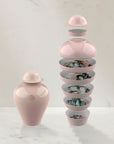 Qing Alhambra Rose stack set showing full pieces from collection on table available at Spacio India for Luxury Home Decor Collection of Tableware Accessories