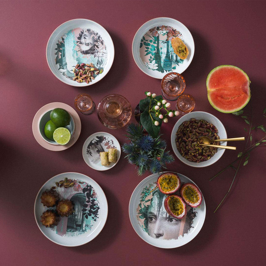 Close look of Qing Alhambra Rose stack set laying on dining table with other cutlery & kitchen accessories with food ingredients available at Spacio India for Luxury Home Decor Collection of Tableware Accessories