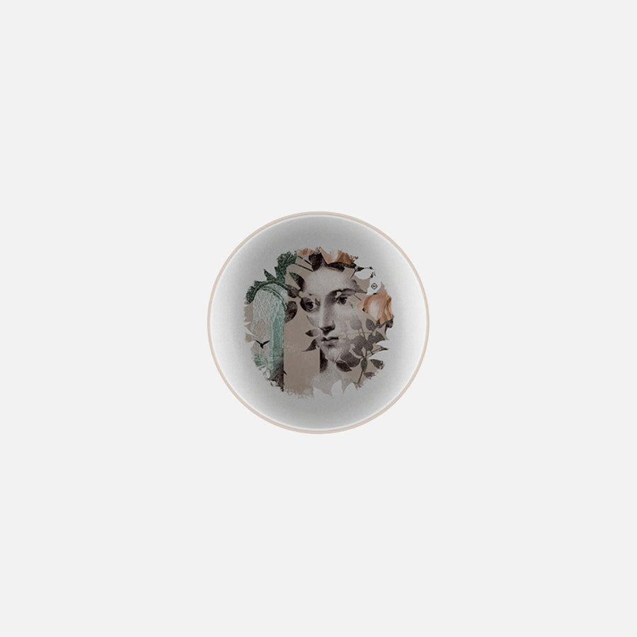 Medium plate with leaves, flowers & human face art on it from Qing Alhambra Rose stack set on a white back ground available at Spacio India for Luxury Home Decor Collection of Tableware Accessories
