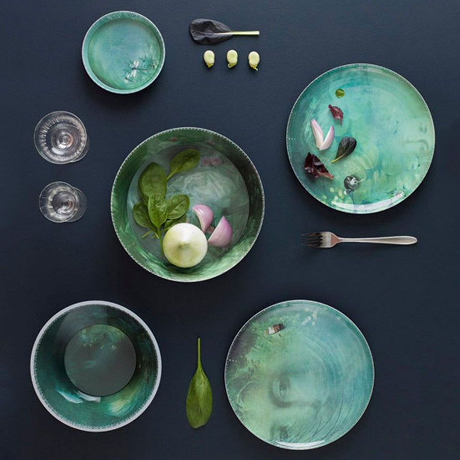 Ibride Yuan Noir Narcisse Stack table set on a table with cutlery & some food ingredients available at Spacio India for home decor collection of Tableware Accessories