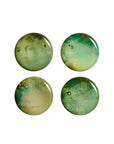 Ibride Yuan Noir Narcisse Stack table set with four green art printed plates available at Spacio India for home decor collection of Tableware Accessories