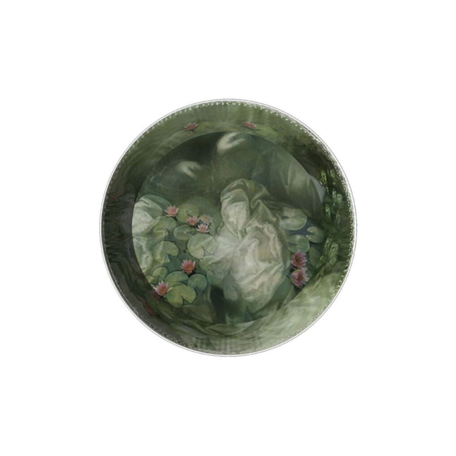 A plate from Ibride Yuan Noir Narcisse Stack table set containing a print of lotus flowers in a lake available at Spacio India for home decor collection of Tableware Accessories