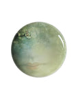 A plate from Ibride Yuan Noir Narcisse Stack table set containing a print human face & a boat available at Spacio India for home decor collection of Tableware Accessories