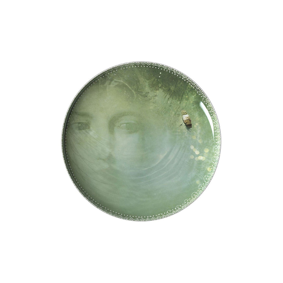 A plate from Ibride Yuan Noir Narcisse Stack table set containing a print human face & a boat available at Spacio India for home decor collection of Tableware Accessories