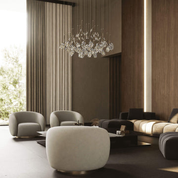 Modern living room with stylish furniture and a Bloome chandelier from Italamp 