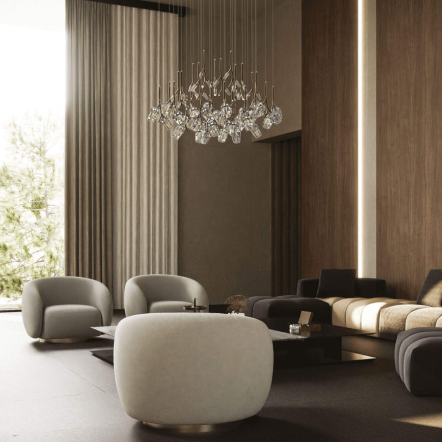 Modern living room with stylish furniture and a Bloome chandelier from Italamp 