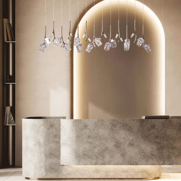 Modern reception desk with Bloome pendant crystal lights