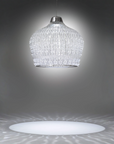 Illuminate your space with an Italamp Crowns Chandelier crafted in Italy. Featuring a clear glass shade, this stunning Italamp Crowns Chandelier adds elegance to any room.