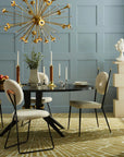 Jonathan Adler Camille Bust Sculpture styled atop a modern pedestal in a contemporary dining setting, accentuating luxury interiors, from Spacio India stores and online.