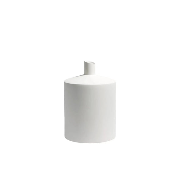 A minimalist white ceramic vase with a cylindrical body and a short, angled neck, shown on a seamless white background.