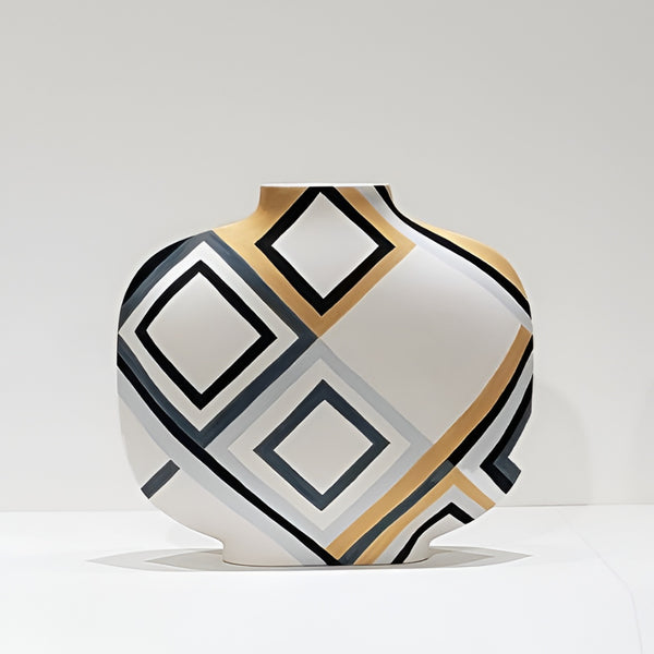 A modern ceramic vase with a rounded, bulbous body and a narrow neck, decorated with a geometric diamond pattern in black, gray, white, and gold on a clean white background.