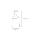 A simple line drawing of a bottle with dimension labels showing height as 11.8 in (30 cm) and width as 5.