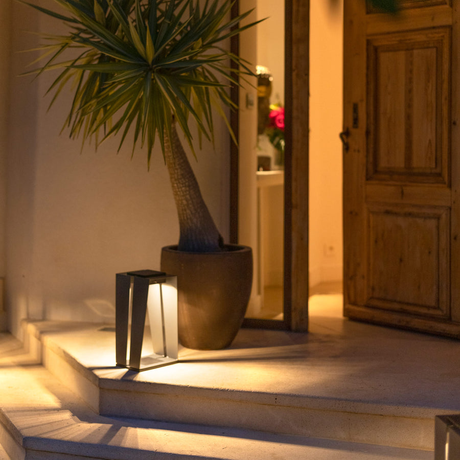 Enhance your outdoor oasis with the LJ Solar Lantern SKAAL Tink120 Small 500L Duratek from Les Jardins, a sleek and minimalistic lamp that adds a touch of Scandinavian modernism to your steps. Complete the look by pairing it with a.