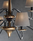 The Lorenzon Divina Chandelier showcases Italian craftsmanship with its metal frame and several shades, exuding timeless elegance.