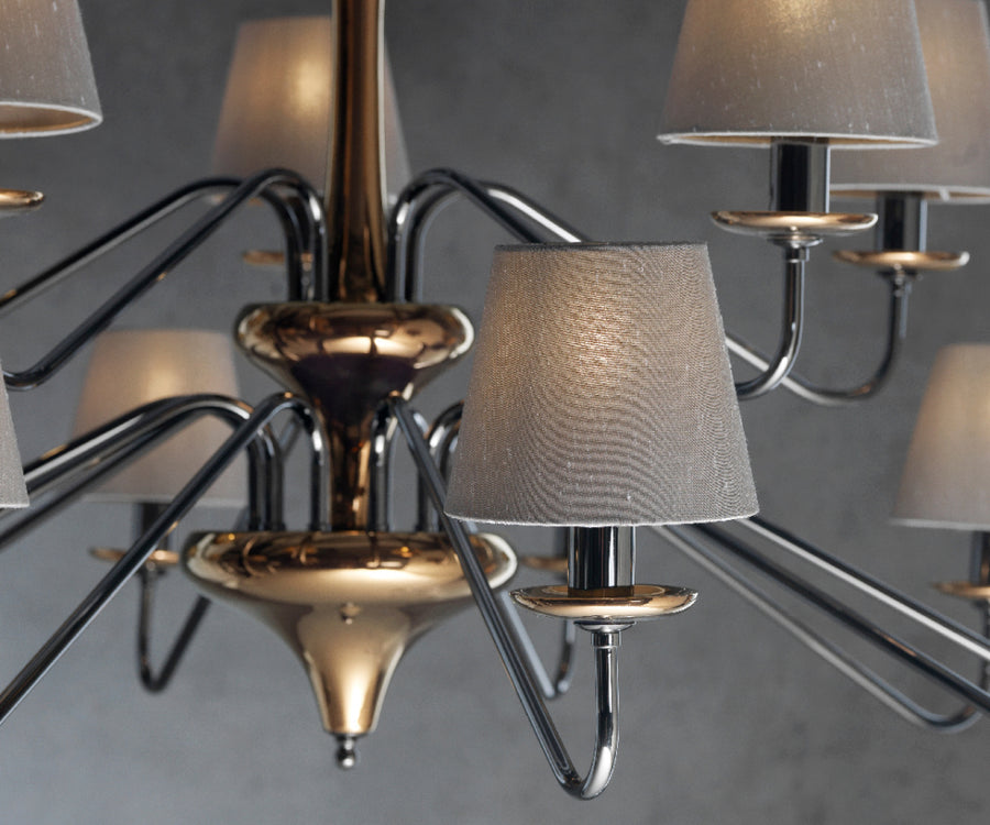 The Lorenzon Divina Chandelier showcases Italian craftsmanship with its metal frame and several shades, exuding timeless elegance.