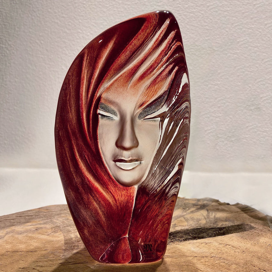 Maleras Crystal Noviata Red Sculpture on a wooden surface in modern interior available at Spacio India from Sculpture and Art Objects Collection.