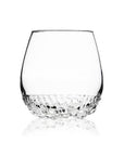 A clear glass rocks tumbler with a textured, faceted hammered base, shown on a clean white background with a soft reflection below.
