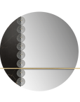 Round mirror with black and gold decorative elements on a white background