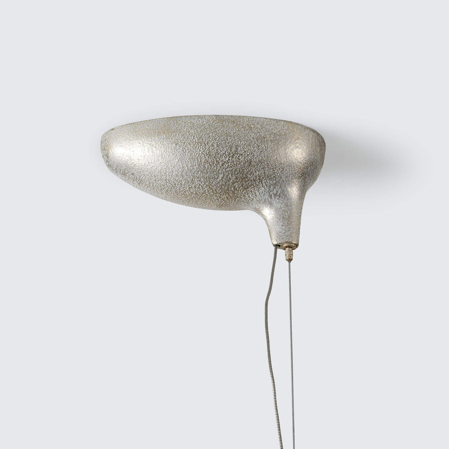 Silver pendant light fixture on a white background
