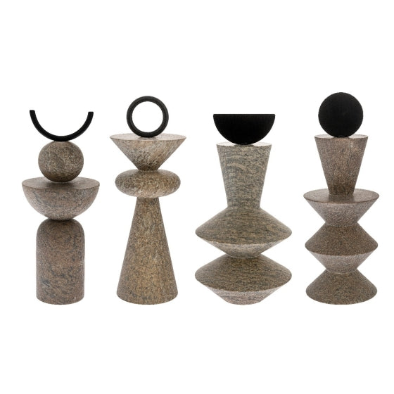 Set of four stone decorative objects with black circular elements on a white background
