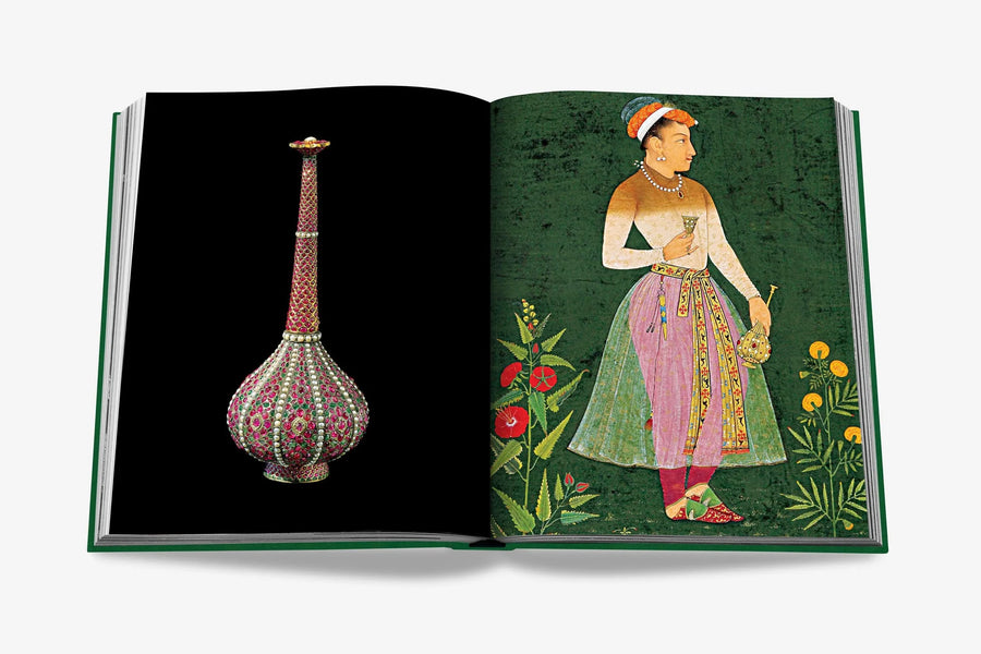 2 page spread featuring a jewelled wine decanter. Beyond Extravagance coffee table book by Assouline, featuring the Al Thani Collection of Indian royal jewels and artefacts, spanning 400 years of history.