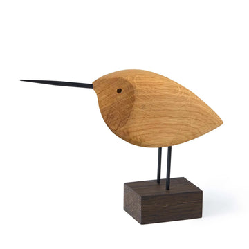 A Warm Nordic Beak Bird Awake Snipe Oak figurine resting on a wooden base in true Scandinavian aesthetics.