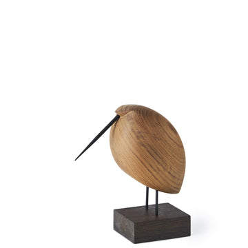 A Warm Nordic Beak Bird Lazy Snipe Oak sculpture on a Warm Nordic design wooden base.