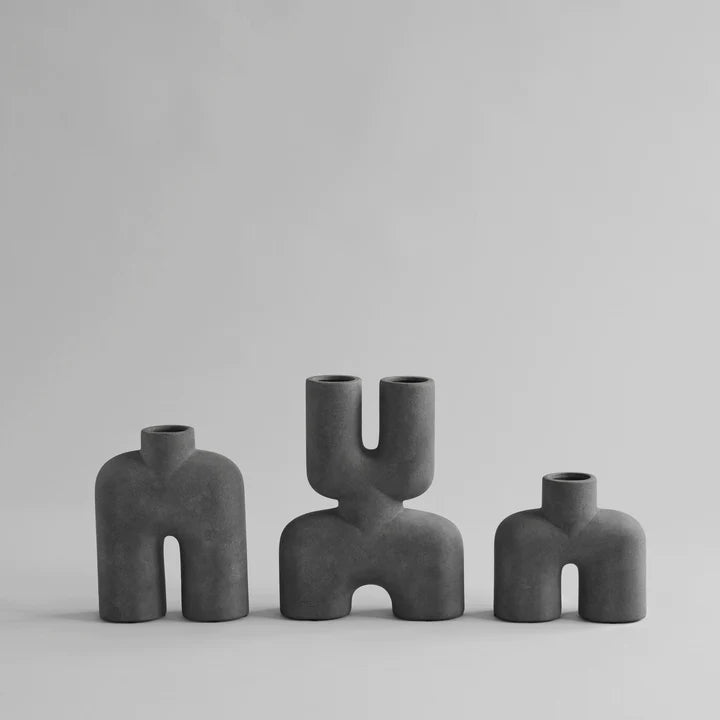 Three 101Cph Cobra Tall Mini Dark Grey 211034 vases by 101 Copenhagen on a white background.