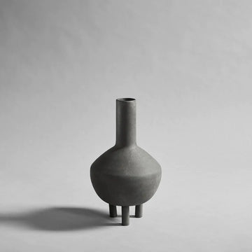 A small 101Cph Duck Fat Dark Grey 111281 vase by 101 Copenhagen on a white background.