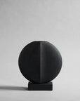 A 101Cph Guggenheim Mini Black 111126 by 101 Copenhagen on a white background that adds a whimsical touch to any interior setting.