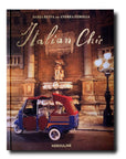 An Assouline Coffee Table Book Italian Chic that exudes beauty and style showcasing a red car in front of a charming fountain.