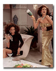 A woman in a glamorous gold dress is holding a glass of champagne, exuding luxury and style in the world of Assouline Coffee Table Book Moschino.