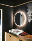 A bathroom with Meystyle Lattice Systems LED Wall Paper with Swarovski walls and a round mirror featuring ambient lighting from Meystyle.
