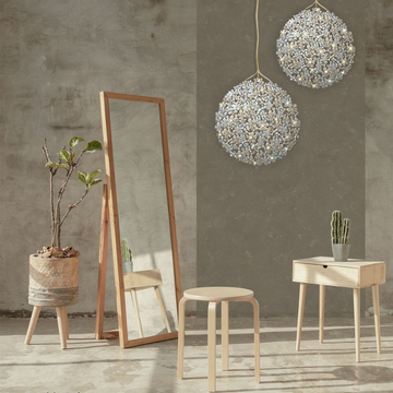 This room is beautifully lit with ambient lighting provided by a stylish Meystyle Germanium LED Wall Paper with Swarovski. The mirror adds dimension to the space while the stool offers a convenient and comfortable seating option.